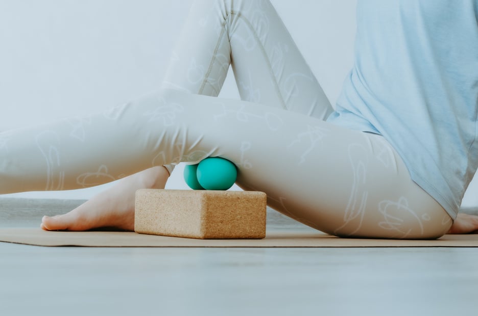 Hamstrings myofascial release massage with  balls on cork block